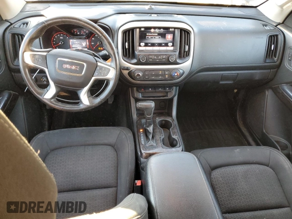 2015 GMC Canyon 4WD SLE with VIN 1GTH6BE37F1133213, listed as a Copart auction lot 82404014 with 142,149 mi miles and Salvage Title. Bid and sale history available at carsss.com. Image 8.