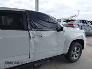 2020 Chevrolet Colorado 2WD Z71 with VIN 1GCGSDEN2L1159458, listed as a IAAI auction lot 42412924 with 90,011 mi miles and . Bid and sale history available at DreamBid. Image 12.