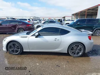 2014 Subaru BRZ Limited with VIN JF1ZCAC11E8604633, listed as a IAAI auction lot 41466704 with 142,025 mi miles. Bid and sale history available at carsss.com. Image 14.