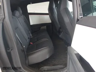 2024 Tesla Cybertruck with VIN 7G2CEHEDXRA017616, listed as a IAAI auction lot 41916341 with 7,373 mi miles. Bid and sale history available at carsss.com. Image 8.