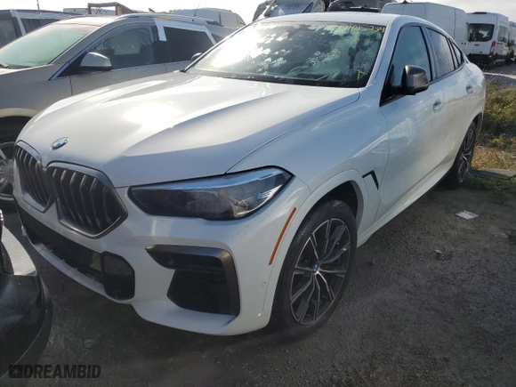 2022 BMW X6 M50i with VIN 5UXCY8C07N9K86690, listed as a Copart auction lot 74115254 with 0 mi miles and Salvage Title. Bid and sale history available at carsss.com. Image 1.