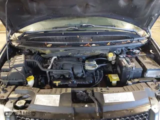 2001 Dodge Caravan Sport with VIN 1B4GP45321B213085, listed as a IAAI auction lot 41529881 with 124,818 mi miles. Bid and sale history available at carsss.com. Image 10.