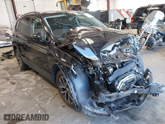 2021 Volkswagen Tiguan S with VIN 3VV0B7AX8MM020189, listed as a IAAI auction lot 42615767 with 70,294 mi miles and . Bid and sale history available at DreamBid. Image 1.
