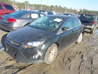 2012 Ford Focus SEL with VIN 1FAHP3M29CL270395, listed as a IAAI auction lot 41763912 with 145,872 mi miles. Bid and sale history available at carsss.com. Image 2.