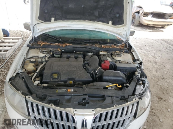2010 Lincoln MKZ с VIN 3LNHL2GC2AR606886, выставлен на аукционе Copart как лот 54137715 с пробегом 77 393 миль миль и Списание • Salvage title. История ставок и продаж доступна на DreamBid. Изображение 11.