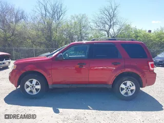 2010 Ford Escape XLT with VIN 1FMCU0D75AKB11394, listed as a IAAI auction lot 42037996 with 150,815 mi miles. Bid and sale history available at carsss.com. Image 14.