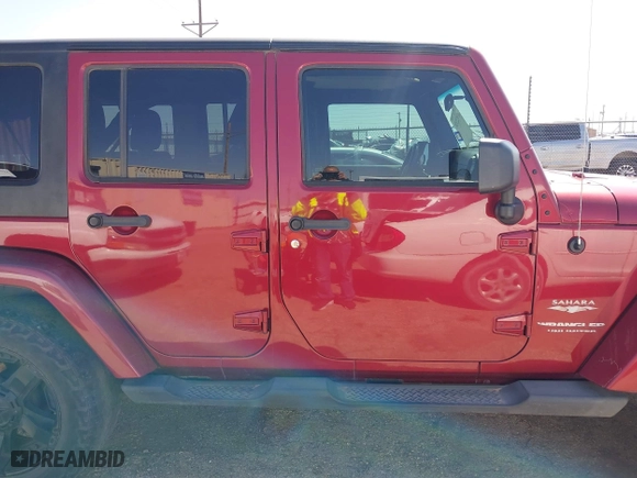 2011 Jeep Wrangler Unlimited Sahara with VIN 1J4BA5H15BL557871, listed as a IAAI auction lot 41922328 with 206,581 mi miles. Bid and sale history available at carsss.com. Image 14.