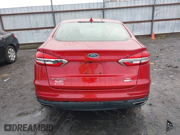 2020 Ford Fusion SE z VIN 3FA6P0T97LR234873, wystawiony jako IAAI lot #41510333 z przebiegiem 65 243 mil mil oraz . Historia ofert i sprzedaży dostępna na DreamBid. Obrazek 16.