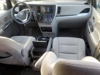 2016 Toyota Sienna LE with VIN 5TDJK3DC6GS135317, listed as a Copart auction lot 87875305 with 213,770 mi miles and Salvage Title. Bid and sale history available at carsss.com. Image 8.
