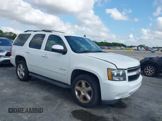 2014 Chevrolet Tahoe LT z VIN 1GNSKBE05ER249363, wystawiony jako IAAI lot #42177287 z przebiegiem 168 395 mil mil oraz . Historia ofert i sprzedaży dostępna na DreamBid. Obrazek 1.