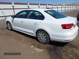 2015 Volkswagen Jetta Sedan 2.0L S with VIN 3VW2K7AJ3FM404609, listed as a IAAI auction lot 42090194 with 159,991 mi miles. Bid and sale history available at carsss.com. Image 3.