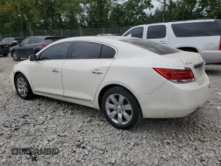 2013 Buick LaCrosse Premium 2 with VIN 1G4GH5E34DF214883, listed as a Copart auction lot 66788474 with 211,396 mi miles and Salvage Title. Bid and sale history available at carsss.com. Image 2.