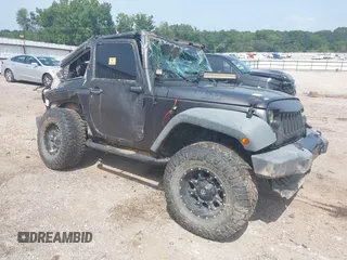 2014 Jeep Wrangler Sport with VIN 1C4AJWAGXEL233647, listed as a IAAI auction lot 39993785 with Not Provided miles and . Bid and sale history available at DreamBid. Image 1.