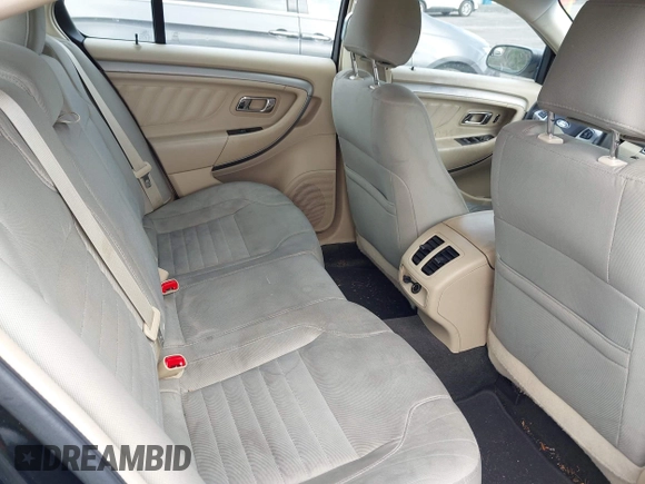 2014 Ford Taurus SE z VIN 1FAHP2D87EG165025, wystawiony jako IAAI lot #42226401 z przebiegiem 209 411 mil mil oraz . Historia ofert i sprzedaży dostępna na DreamBid. Obrazek 8.