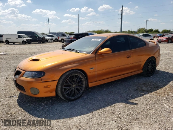 2006 Pontiac GTO z VIN 6G2VX12U76L521089, wystawiony jako Copart lot #73374044 z przebiegiem 87 963 mil mil oraz Szkoda całkowita • Salvage title. Historia ofert i sprzedaży dostępna na DreamBid. Obrazek 1.