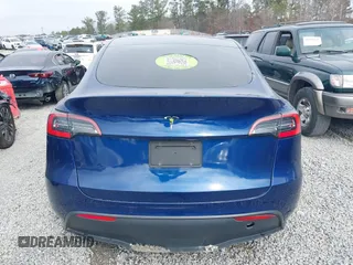 2021 Tesla Model Y Standard Range with VIN 5YJYGDED8MF122985, listed as a IAAI auction lot 41430423 with 120,302 mi miles and . Bid and sale history available at carsss.com. Image 15.