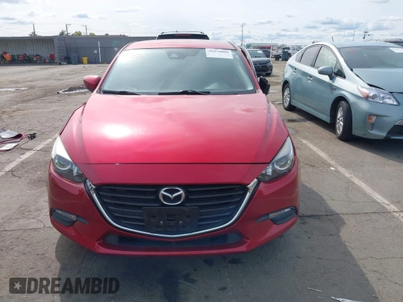 2017 Mazda 3 Touring with VIN 3MZBN1V79HM129043, listed as a IAAI auction lot 41970009 with 142,654 mi miles and . Bid and sale history available at DreamBid. Image 12.