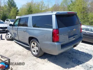 2016 Chevrolet Suburban LT z VIN 1GNSKHKC4GR427591, wystawiony jako IAAI lot #42162723 z przebiegiem 131 771 mil mil oraz . Historia ofert i sprzedaży dostępna na DreamBid. Obrazek 3.