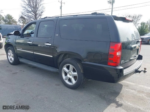 2011 Chevrolet Suburban LTZ with VIN 1GNSKKE37BR331312, listed as a IAAI auction lot 41618886 with 232,901 mi miles. Bid and sale history available at carsss.com. Image 3.