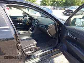 2014 Cadillac ATS Standard RWD with VIN 1G6AA5RA0E0102256, listed as a IAAI auction lot 42659190 with 116,912 mi miles and . Bid and sale history available at DreamBid. Image 5.
