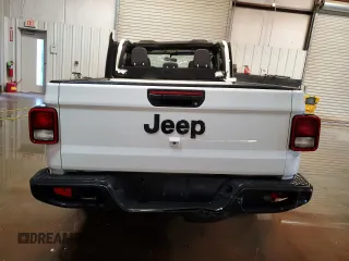 2023 Jeep Gladiator Sport S z VIN 1C6HJTAG0PL523306, wystawiony jako Copart lot #59236535 z przebiegiem 64 185 mil mil oraz Szkoda całkowita • Salvage title. Historia ofert i sprzedaży dostępna na DreamBid. Obrazek 6.
