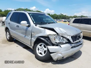 2001 Mercedes-Benz M-Class with VIN 4JGAB54E61A279219, listed as a Copart auction lot 37373650 with 213,349 mi miles and Salvage Title. Bid and sale history available at carsss.com. Image 1.