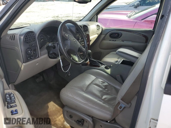 2003 Oldsmobile Bravada z VIN 1GHDT13S632282305, wystawiony jako Copart lot #82548814 z przebiegiem 227 444 mil mil oraz Szkody całkowita. Historia ofert i sprzedaży dostępna na DreamBid. Obrazek 7.