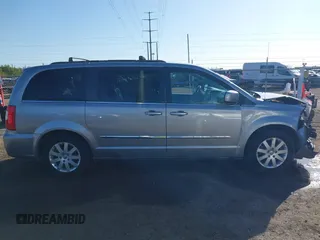 2014 Chrysler Town & Country Touring with VIN 2C4RC1BGXER270140, listed as a IAAI auction lot 41068771 with 144,820 mi miles. Bid and sale history available at carsss.com. Image 13.