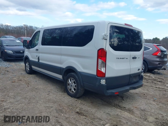 2015 Ford Transit XL z VIN 1FMZK1YM0FKA73392, wystawiony jako IAAI lot #41934194 z przebiegiem 134 281 mil mil oraz . Historia ofert i sprzedaży dostępna na DreamBid. Obrazek 3.