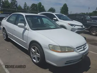 2002 Honda Accord EX z VIN 1HGCG16542A053039, wystawiony jako IAAI lot #42308687 z przebiegiem 206 864 mil mil oraz . Historia ofert i sprzedaży dostępna na DreamBid. Obrazek 1.