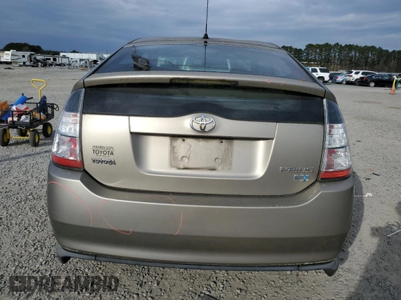 2005 Toyota Prius z VIN JTDKB20U053070122, wystawiony jako Copart lot #86879114 z przebiegiem Nie podano mil oraz Szkoda całkowita • Salvage title. Historia ofert i sprzedaży dostępna na DreamBid. Obrazek 6.