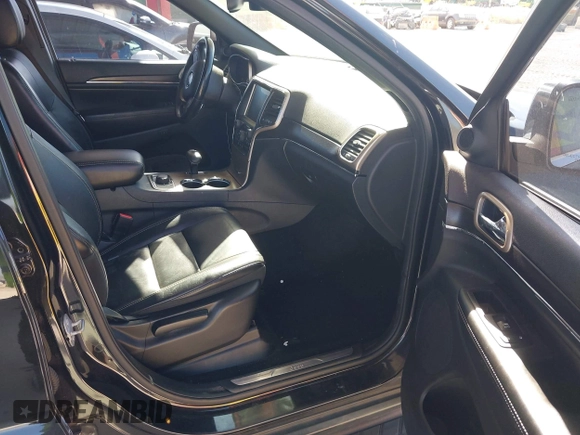 2014 Jeep Grand Cherokee Limited with VIN 1C4RJFBG8EC517456, listed as a IAAI auction lot 41893883 with 141,906 mi miles. Bid and sale history available at carsss.com. Image 5.