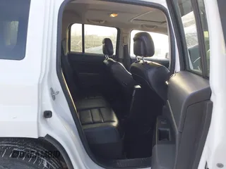 2016 Jeep Patriot Latitude with VIN 1C4NJPFA5GD621054, listed as a IAAI auction lot 41607714 with 118,625 mi miles and . Bid and sale history available at DreamBid. Image 8.