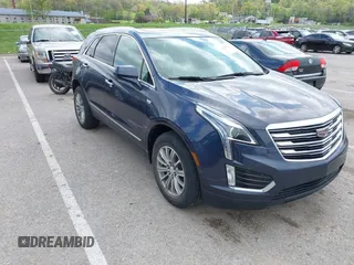 2019 Cadillac XT5 Luxury FWD with VIN 1GYKNCRS7KZ199542, listed as a IAAI auction lot 42032139 with 79,487 mi miles and . Bid and sale history available at DreamBid. Image 1.