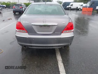 2006 Acura RL z VIN JH4KB16516C012532, wystawiony jako IAAI lot #42095836 z przebiegiem 177 194 mil mil oraz . Historia ofert i sprzedaży dostępna na DreamBid. Obrazek 17.