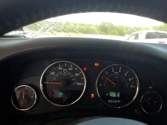 2017 Jeep Wrangler Unlimited Rubicon with VIN 1C4BJWFG4HL677477, listed as a Copart auction lot 57758175 with 89,584 mi miles and Salvage title. Bid and sale history available at DreamBid. Image 9.
