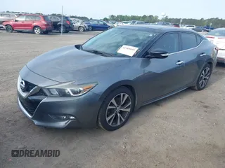 2016 Nissan Maxima SL with VIN 1N4AA6AP8GC430051, listed as a IAAI auction lot 41983059 with 166,786 mi miles and . Bid and sale history available at DreamBid. Image 20.