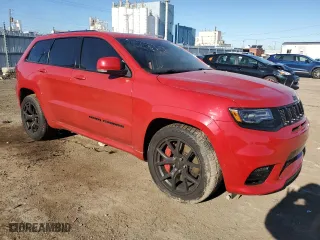 2021 Jeep Grand Cherokee SRT with VIN 1C4RJFDJ8MC529839, listed as a Copart auction lot 80329054 with 29,526 mi miles and Salvage Title. Bid and sale history available at carsss.com. Image 4.