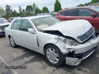 2001 Lexus LS 430 with VIN JTHBN30F110026221, listed as a IAAI auction lot 42022976 with 142,418 mi miles. Bid and sale history available at carsss.com. Image 13.