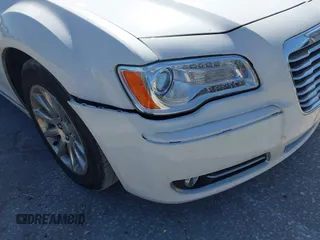 2014 Chrysler 300 with VIN 2C3CCAET6EH173381, listed as a IAAI auction lot 42158270 with 124,551 mi miles. Bid and sale history available at carsss.com. Image 6.