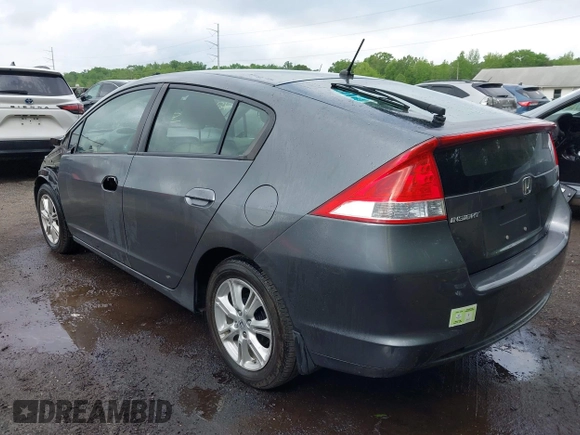 2010 Honda Insight EX with VIN JHMZE2H73AS025856, listed as a IAAI auction lot 42183307 with 71,564 mi miles and . Bid and sale history available at DreamBid. Image 3.