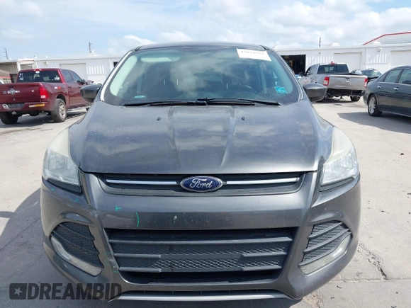 2015 Ford Escape SE with VIN 1FMCU0G7XFUA89965, listed as a IAAI auction lot 42072553 with 129,877 mi miles. Bid and sale history available at carsss.com. Image 12.