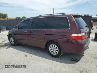 2007 Honda Odyssey Touring with VIN 5FNRL38827B062909, listed as a Copart auction lot 54449875 with 198,457 mi miles and Clean Title. Bid and sale history available at carsss.com. Image 2.