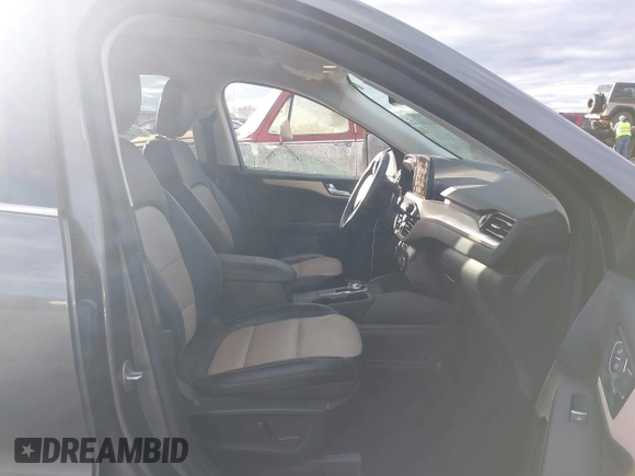 2021 Ford Escape Titanium Hybrid z VIN 1FMCU0DZ0MUB00944, wystawiony jako IAAI lot #41202146 z przebiegiem 52 458 mil mil oraz . Historia ofert i sprzedaży dostępna na DreamBid. Obrazek 5.