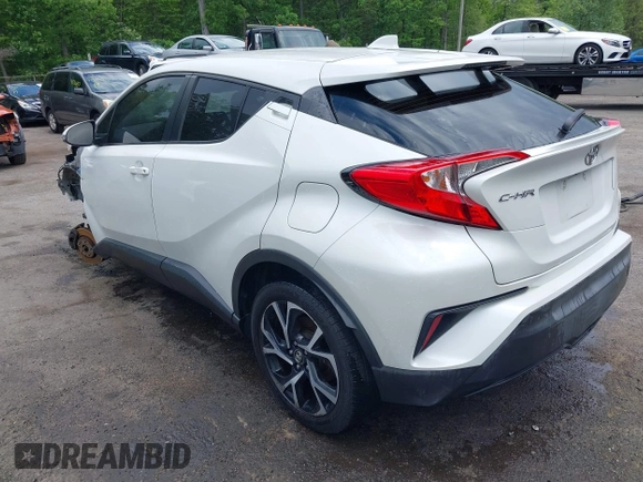 2019 Toyota C-HR XLE z VIN NMTKHMBX9KR095031, wystawiony jako IAAI lot #42191087 z przebiegiem 102 167 mil mil oraz . Historia ofert i sprzedaży dostępna na DreamBid. Obrazek 3.