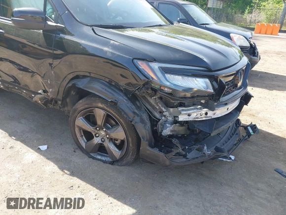 2021 Honda Passport Touring z VIN 5FNYF8H96MB014947, wystawiony jako IAAI lot #42150399 z przebiegiem 47 499 mil mil oraz . Historia ofert i sprzedaży dostępna na DreamBid. Obrazek 6.