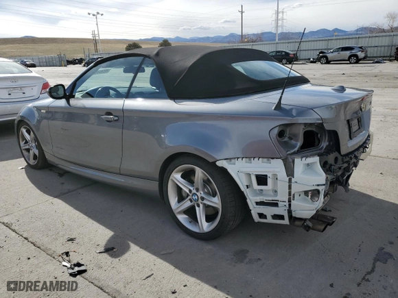 2011 BMW 1 Series 135i with VIN WBAUN7C59BVM24329, listed as a Copart auction lot 49263045 with 65,242 mi miles and Salvage Title. Bid and sale history available at carsss.com. Image 2.