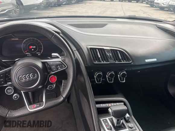 2021 Audi R8 z VIN WUAKBAFX7M7900472, wystawiony jako Copart lot #58422395 z przebiegiem 6493 mil mil oraz Szkody całkowita. Historia ofert i sprzedaży dostępna na DreamBid. Obrazek 9.