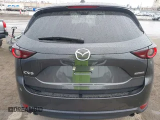 2021 Mazda CX-5 Touring with VIN JM3KFACM6M0480487, listed as a IAAI auction lot 41731646 with 26,951 mi miles and . Bid and sale history available at carsss.com. Image 17.