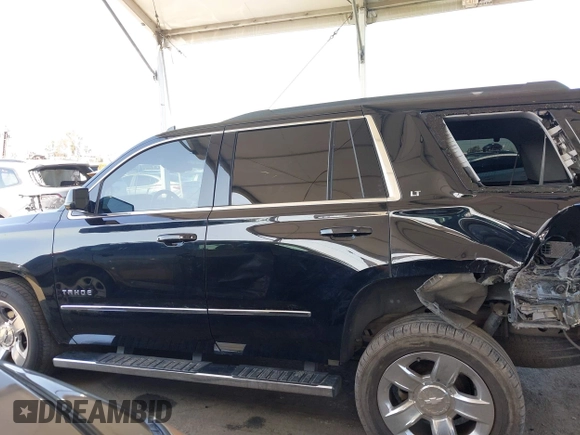 2016 Chevrolet Tahoe LT with VIN 1GNSKBKC5GR481043, listed as a IAAI auction lot 41968681 with 156,172 mi miles and . Bid and sale history available at DreamBid. Image 14.
